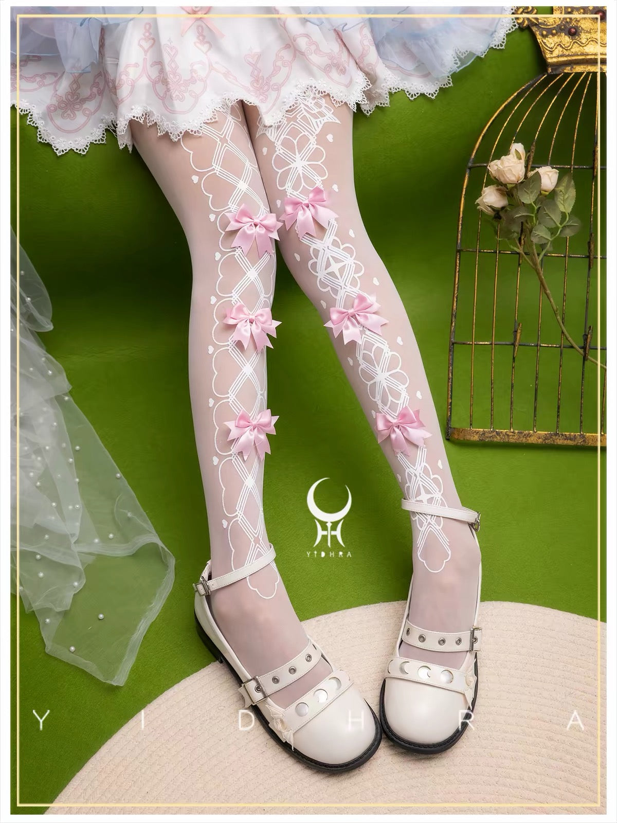 Pink-toned Lolita tights with white lace pattern and white satin bows