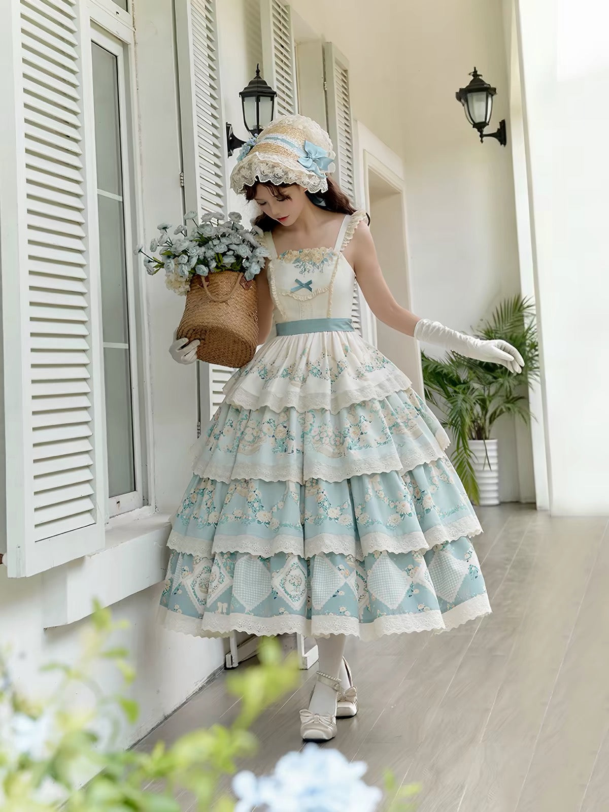 With Puji blue floral Lolita JSK worn with matching waist belt