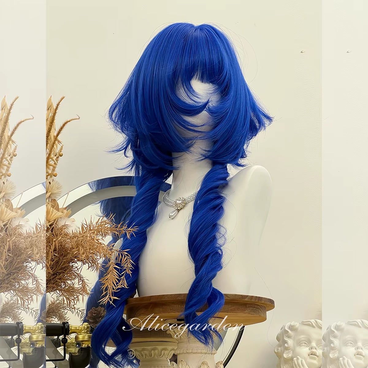 Cobalt blue layered wig angled view with long curled front sections