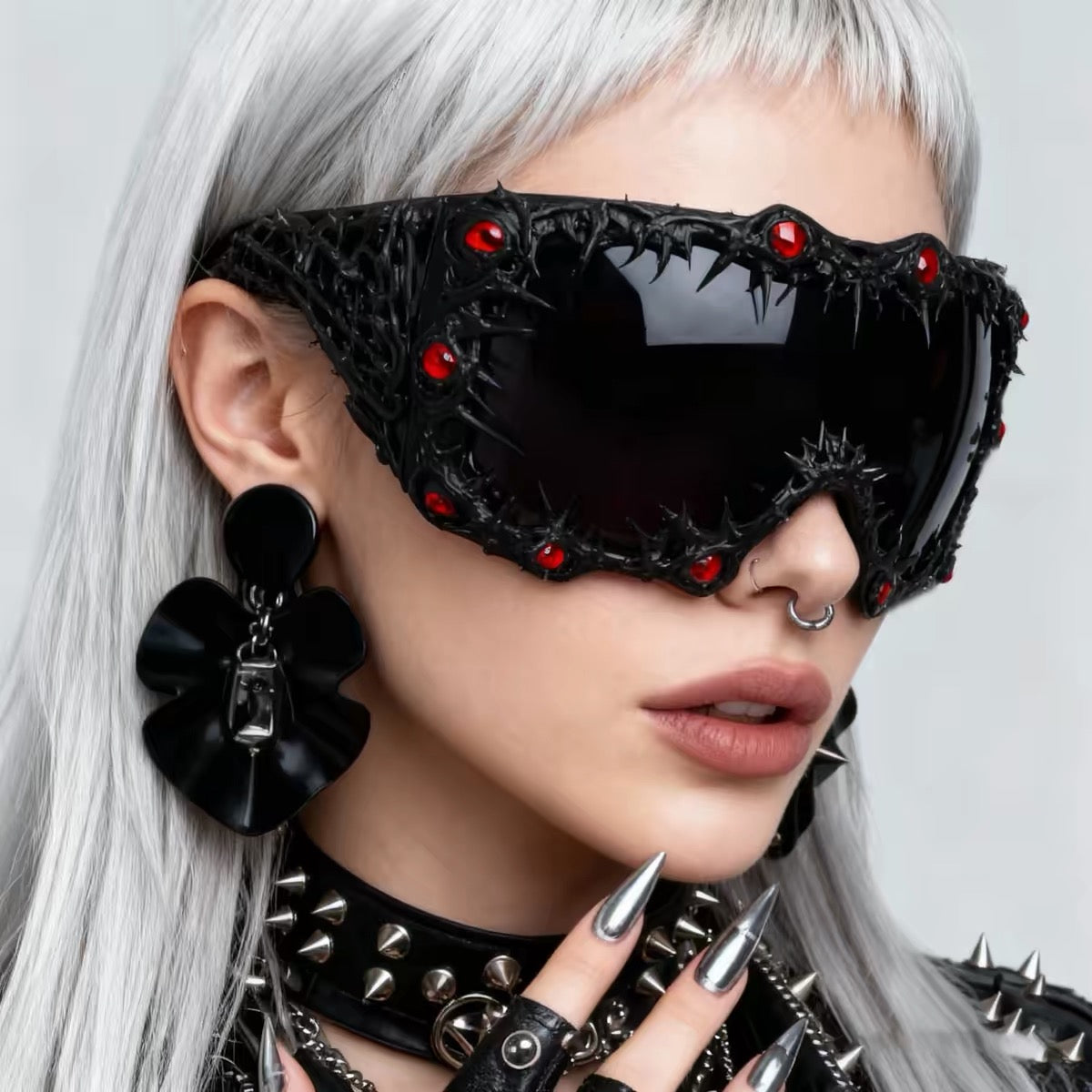 Black wraparound sunglasses with red eye details