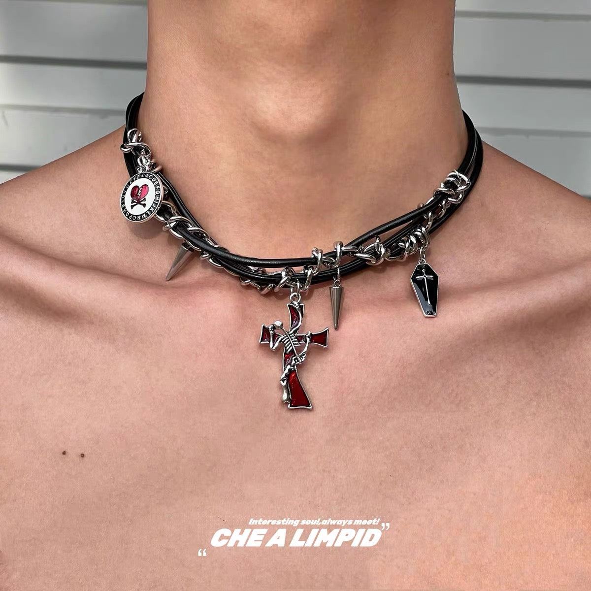 Black layered chain choker with red cross and coffin charms