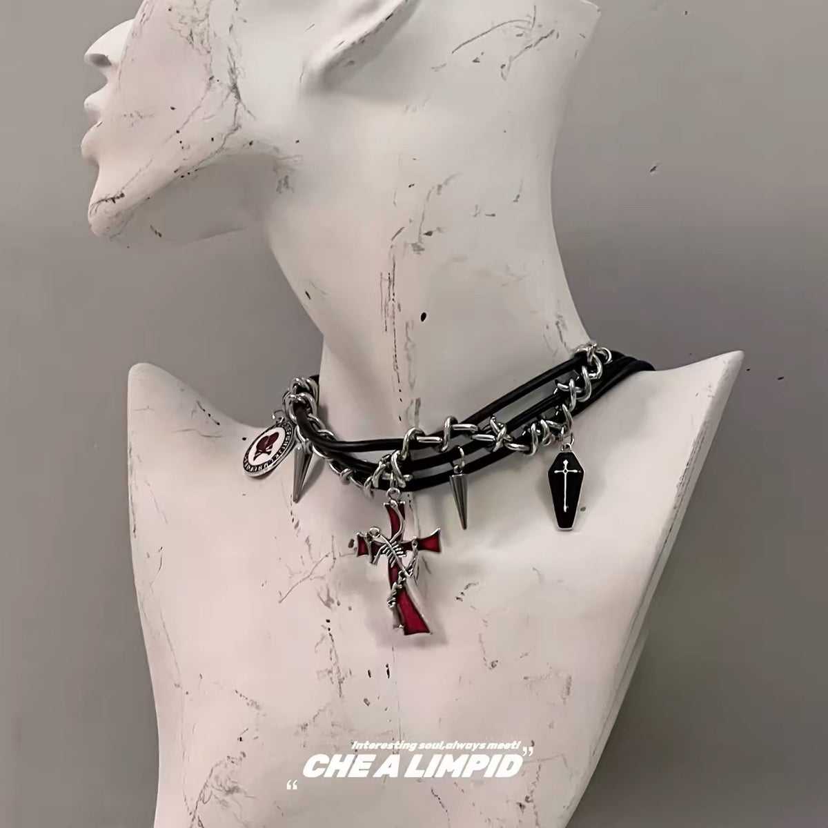 Black chain choker displayed on mannequin