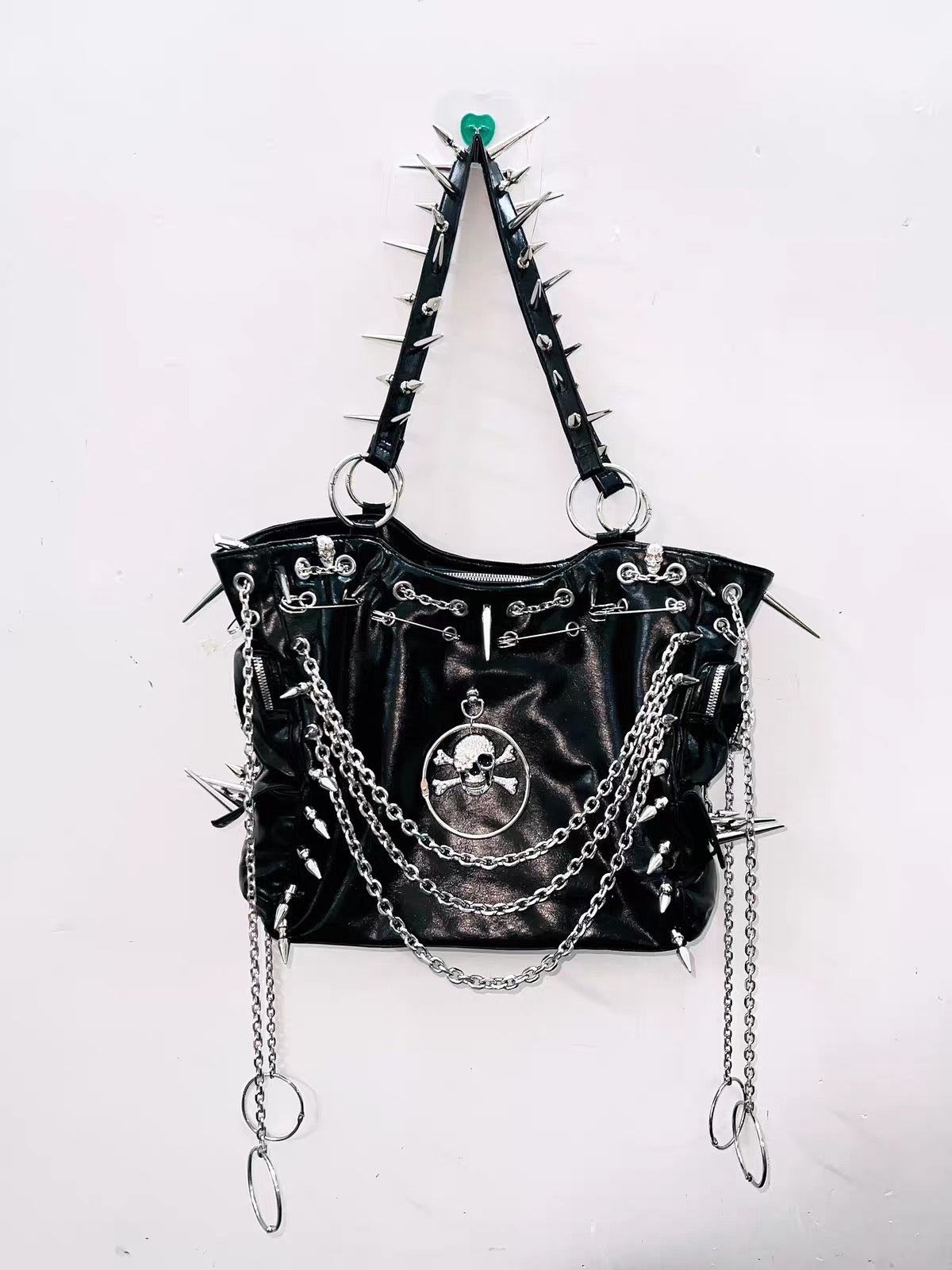 Black spiked chain skull handbag front view