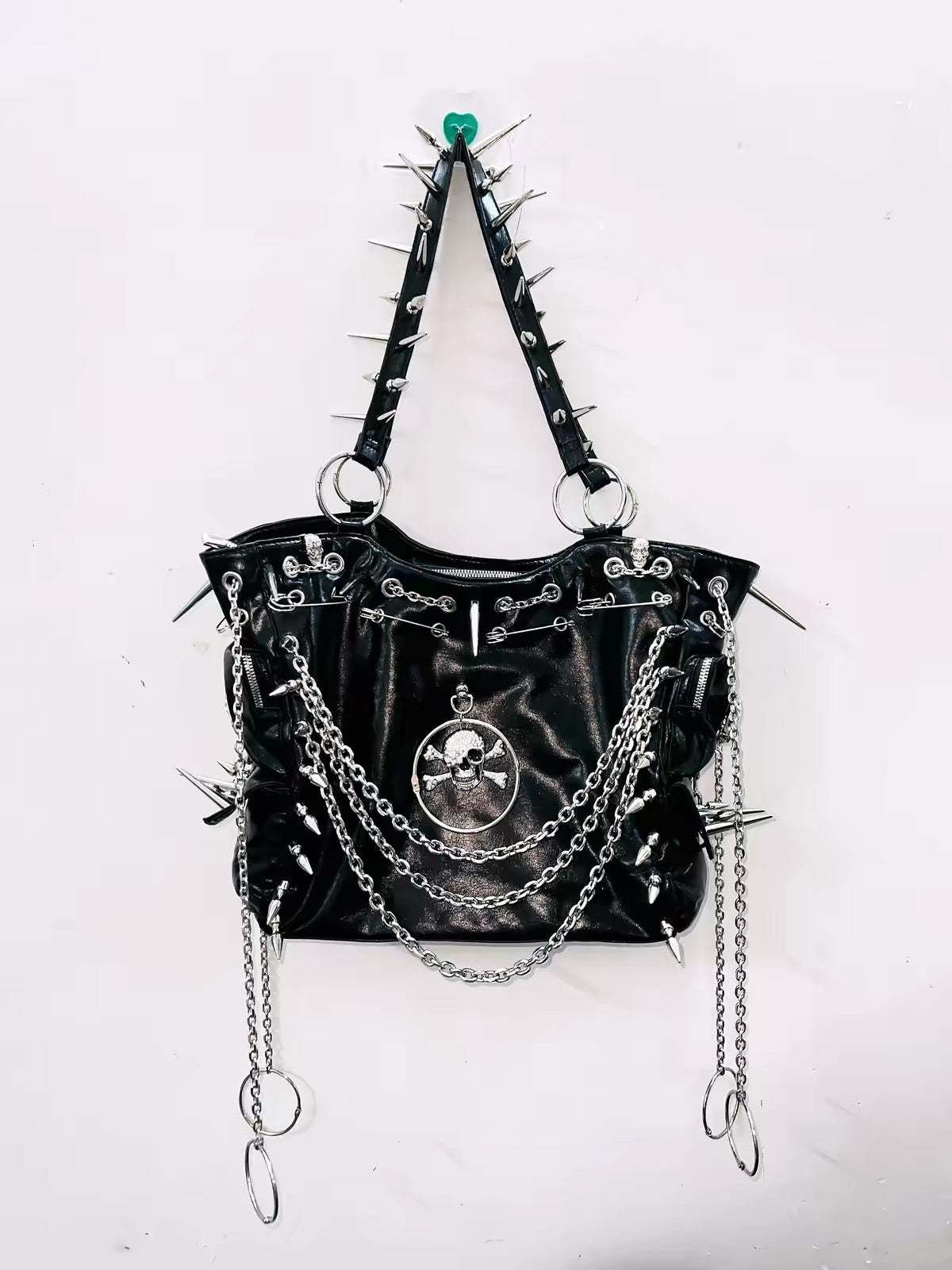 Black spiked chain skull handbag full view