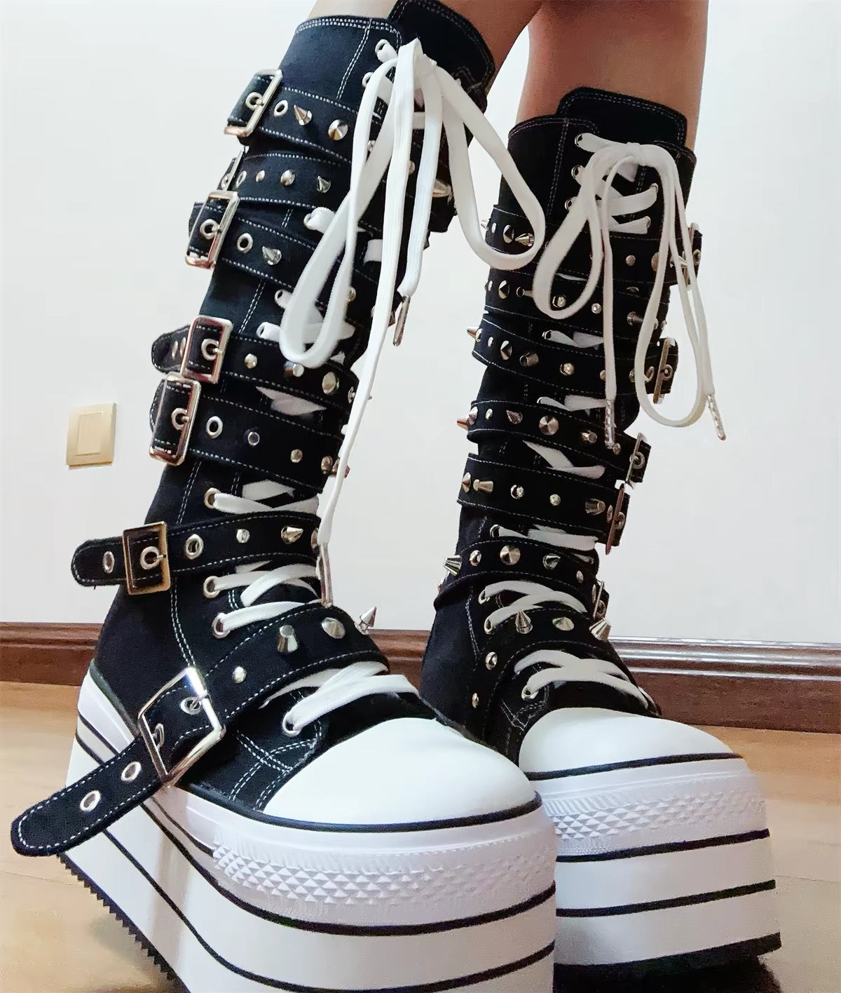 Styled collage showing black and white knee-high platform boots