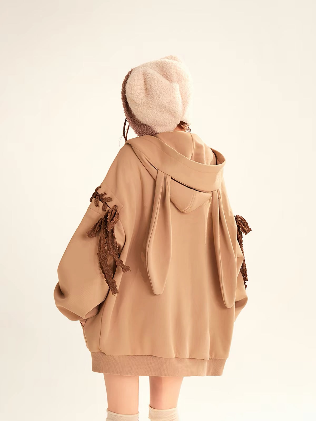 Brown oversized hoodie back view with long ear-like hood panels