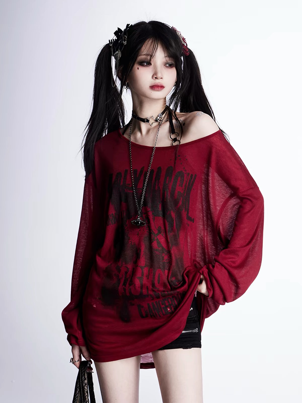 Burgundy oversized graphic long sleeve top styled off shoulder