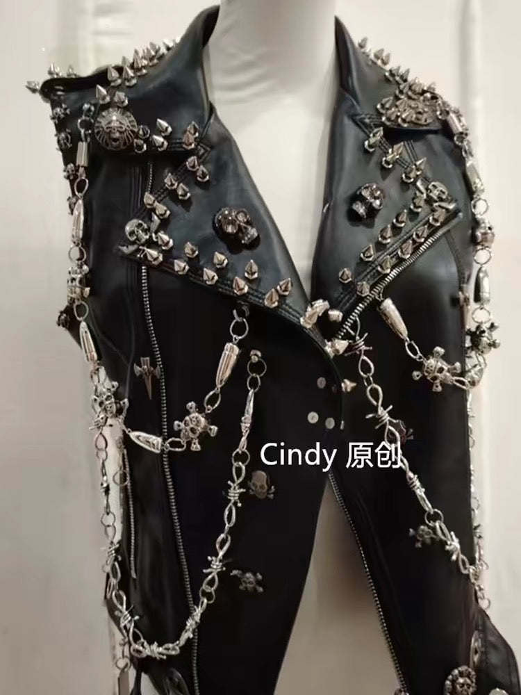 Black sleeveless studded chain vest with skull hardware and chains