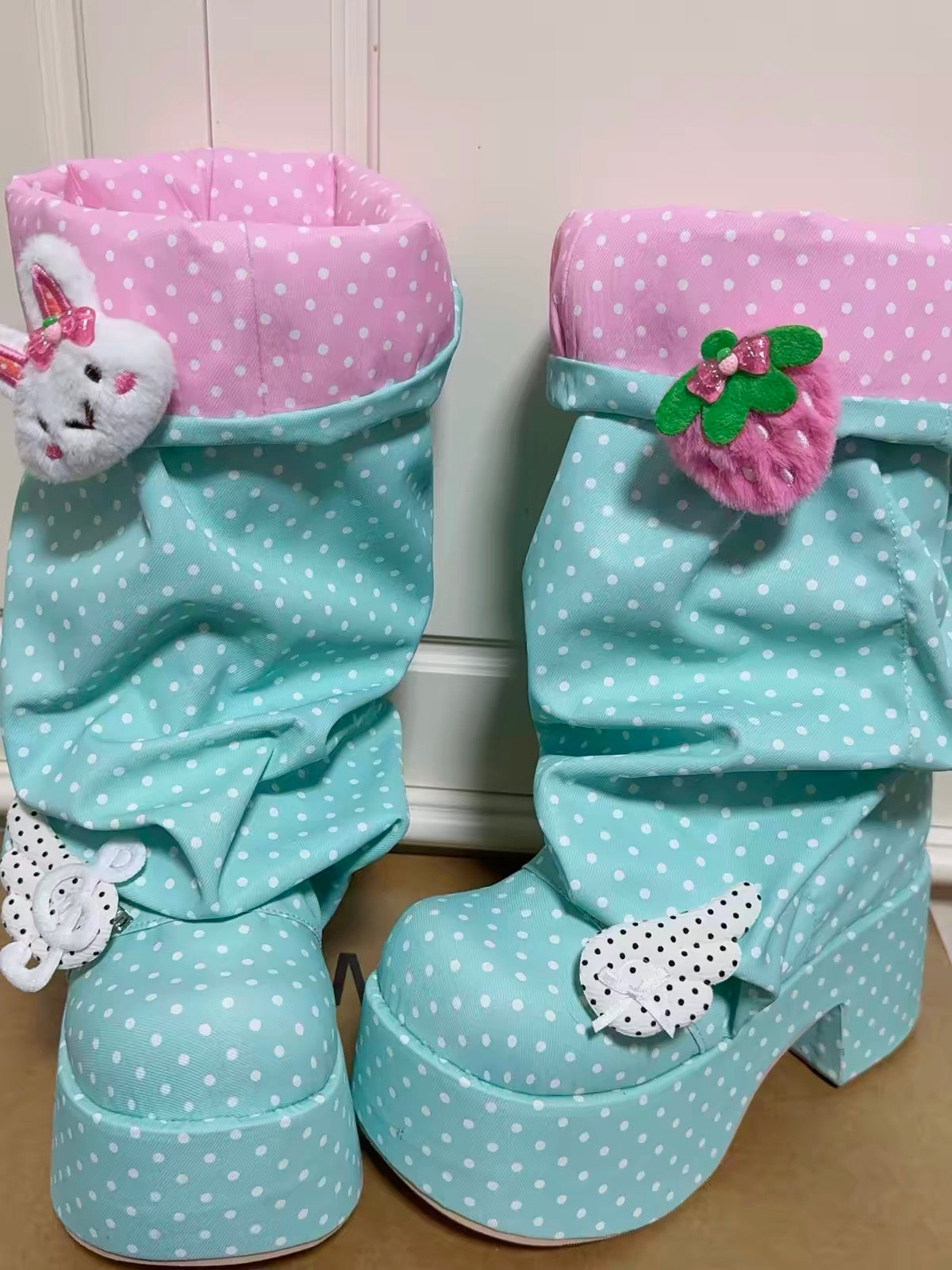 Mint and pink Decora platform boots with rabbit strawberry and wing charms