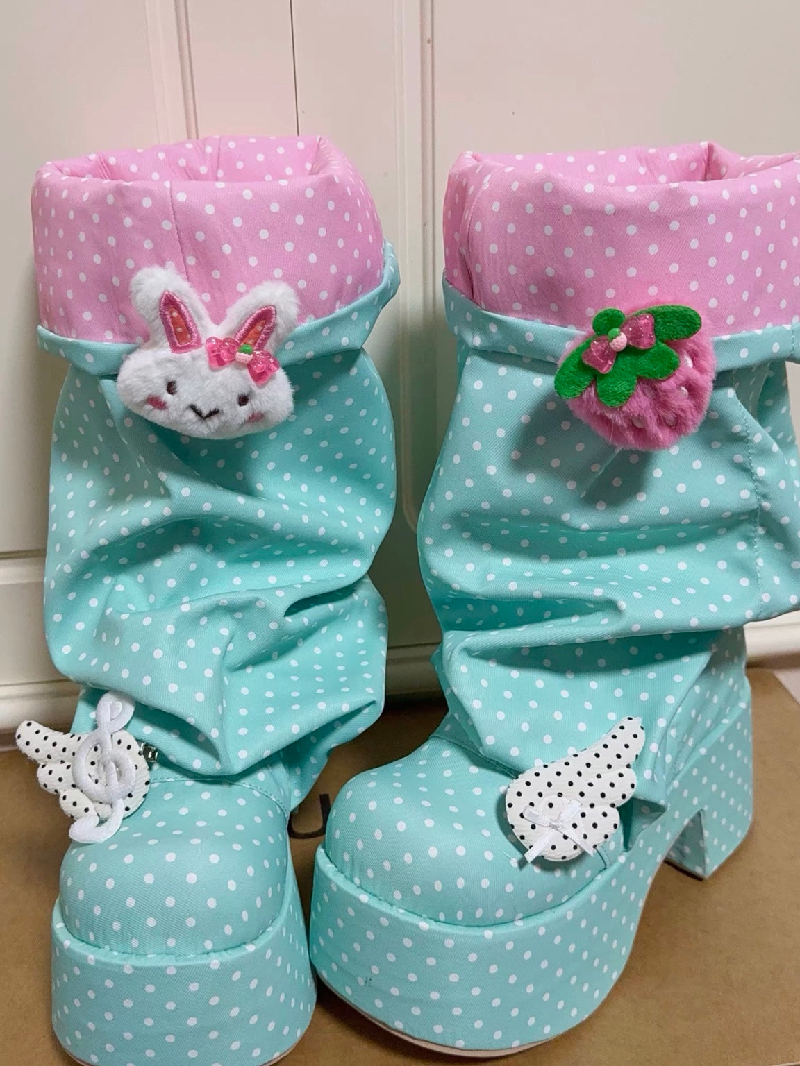 Mint and pink polka dot Decora platform boots front view