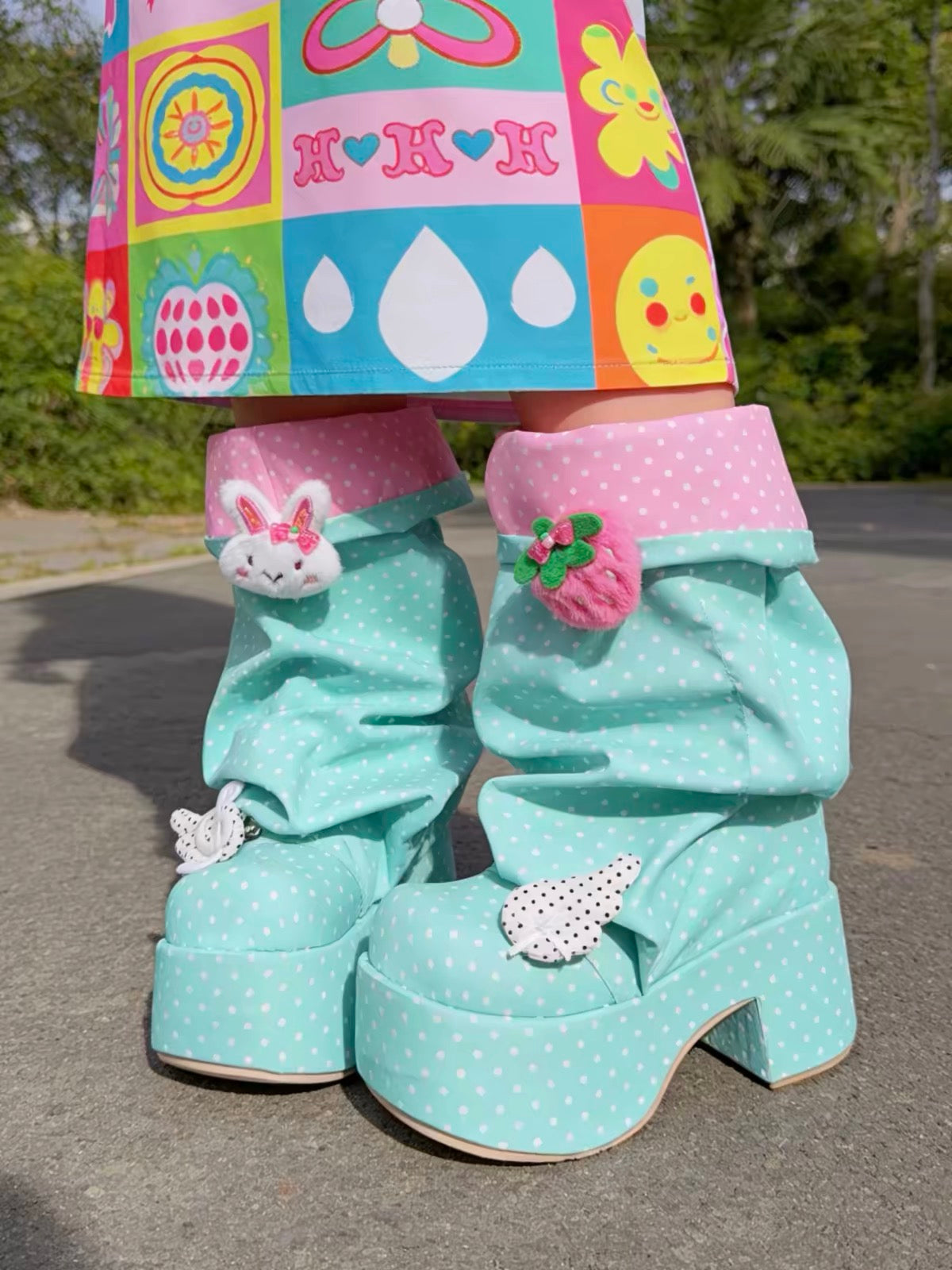 Mint and pink polka dot Decora platform boots with plush charms