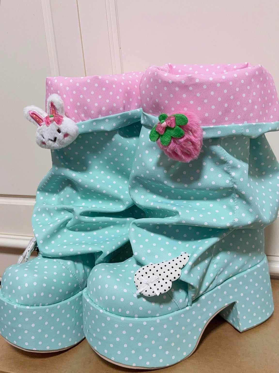 Mint and pink polka dot Decora platform boots pair