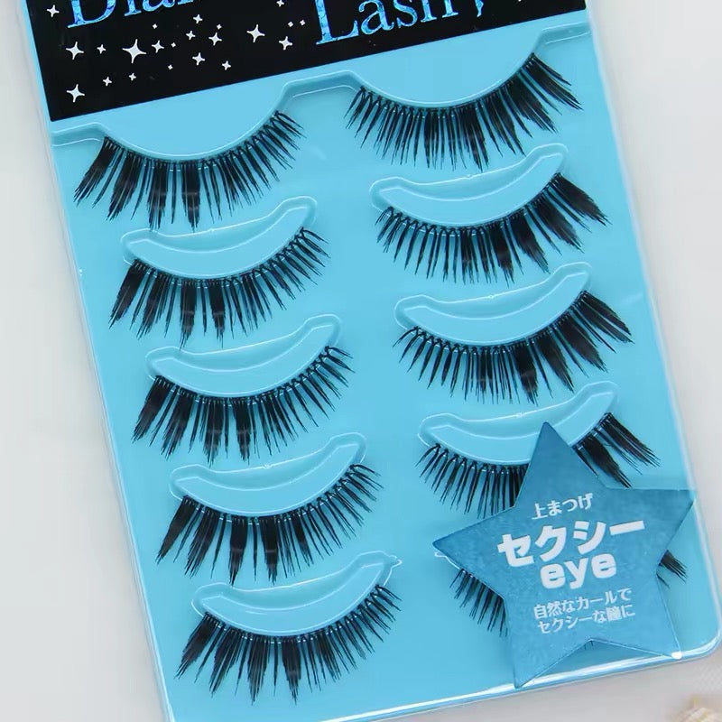 Close-up view of blue Diamond Lash style dupe false eyelashes