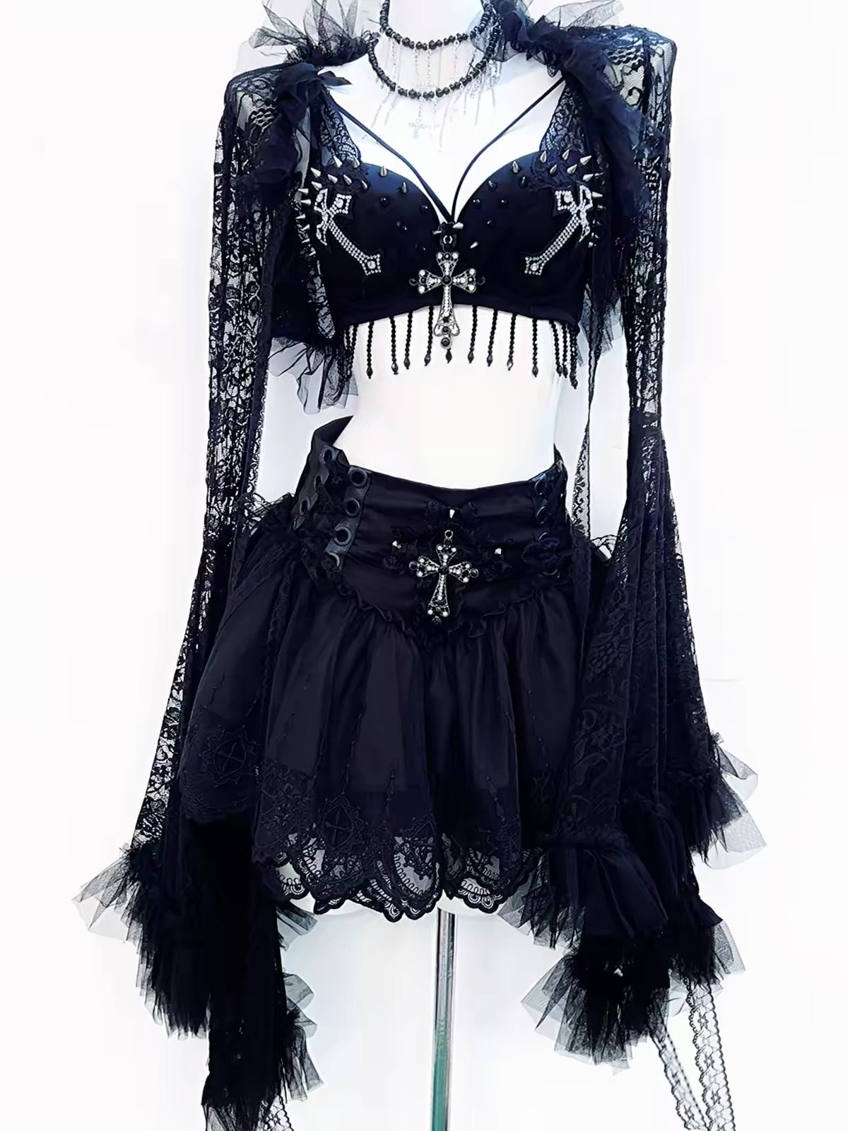 Black gothic lace set front view with cross bra top and layered skirt