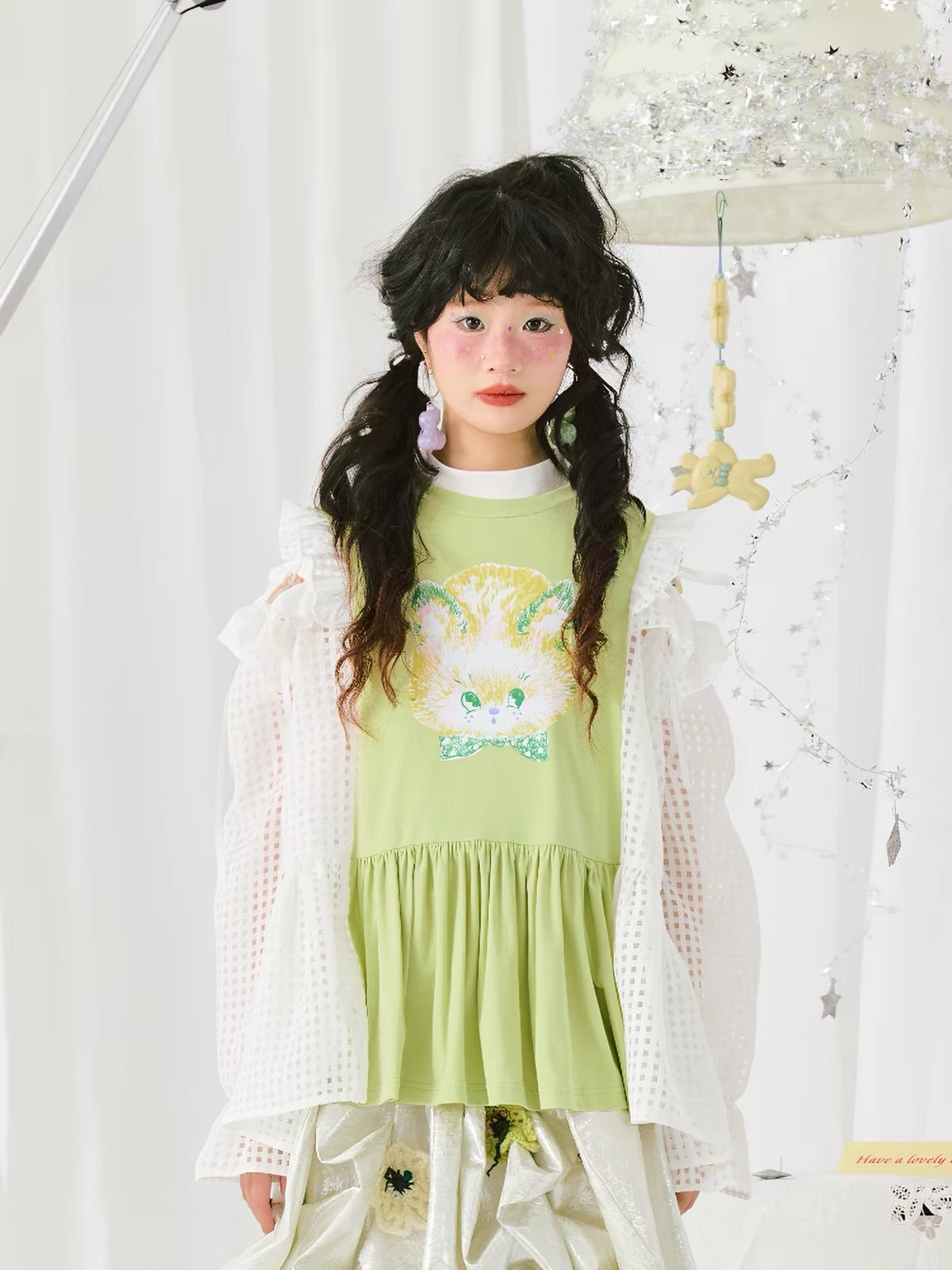Green bunny graphic peplum top