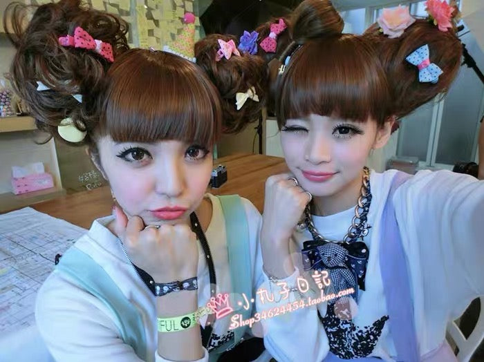 Gyaru models wearing hair bun extensions