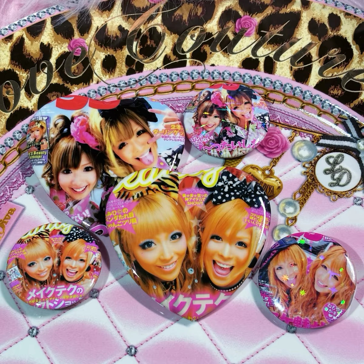 Assorted gyaru magazine style pins and heart badges