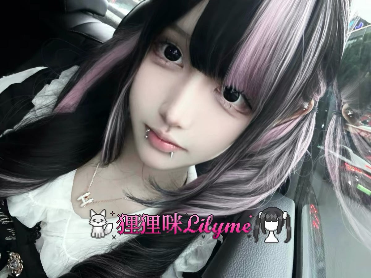 Close-up of black and dusty pink twin-tail curl wig