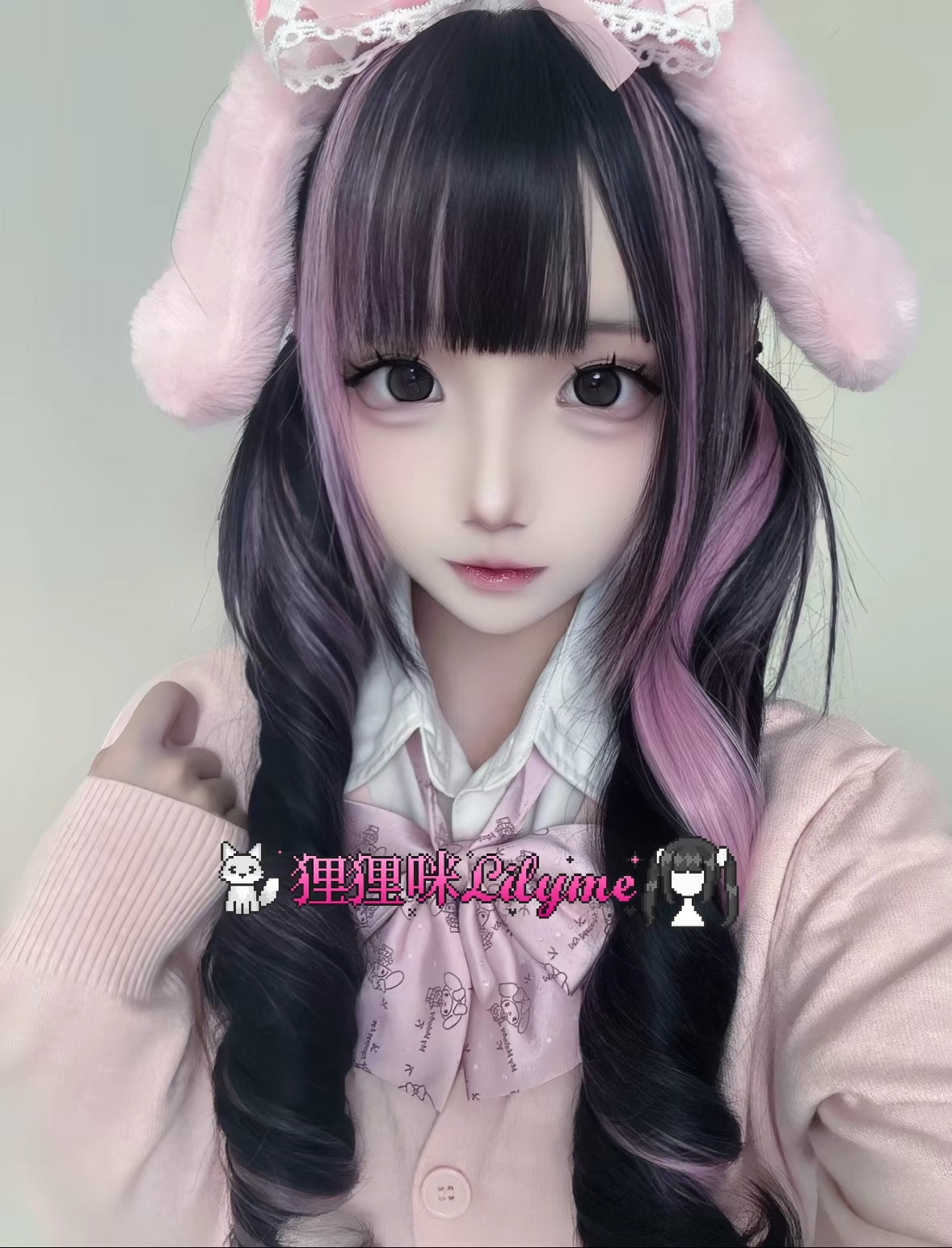 Black and dusty pink twin-tail curl wig styled with soft pink accessories