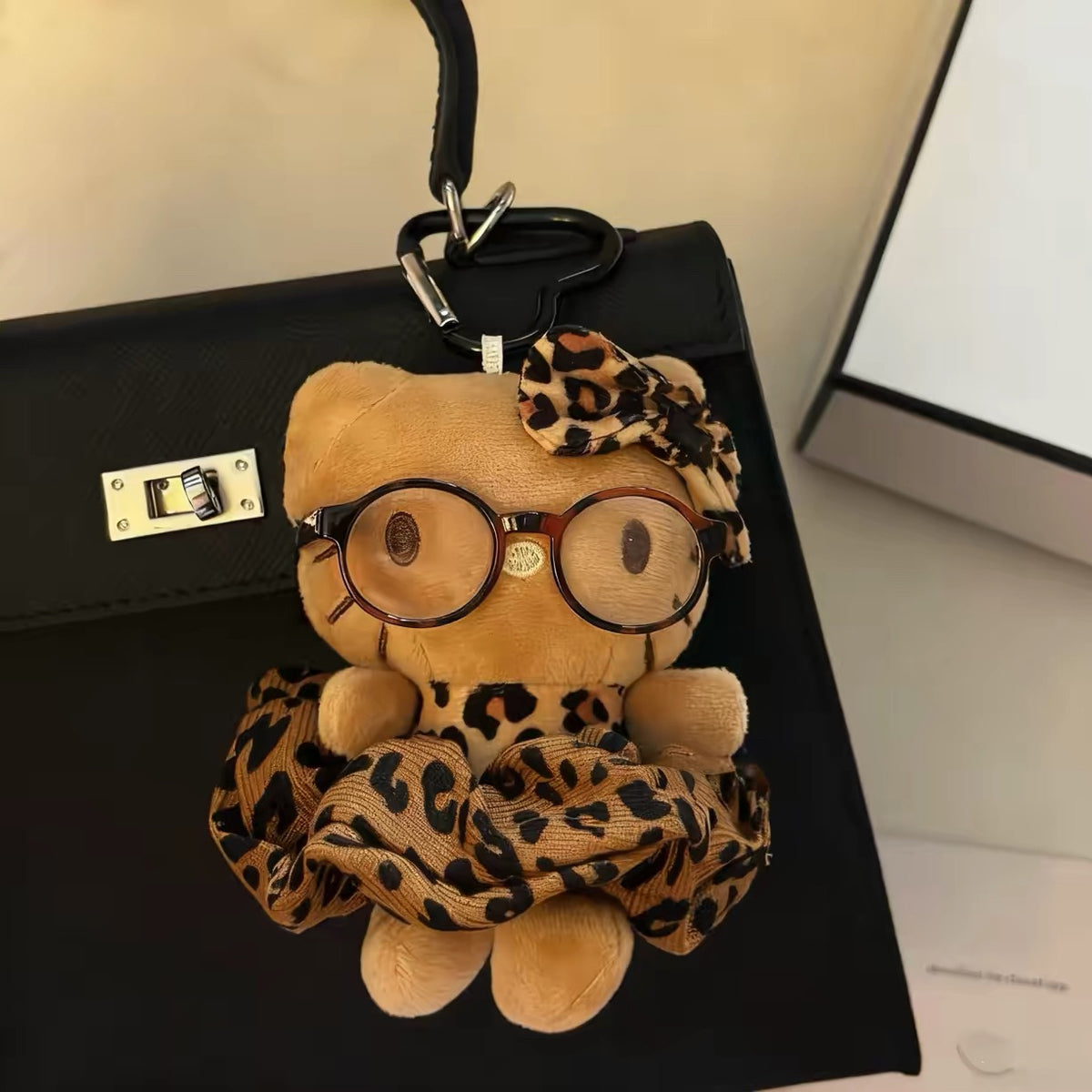 Leopard kitty plush charm with glasses and leopard outfit
