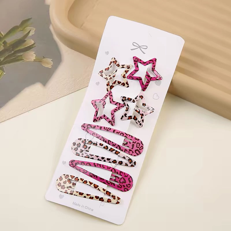 Mixed leopard print star and snap hair clips