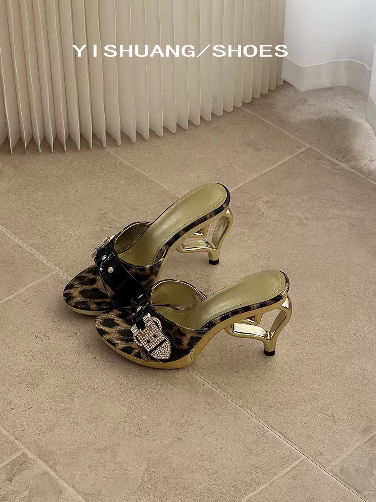 Leopard print mule heels with black buckle strap