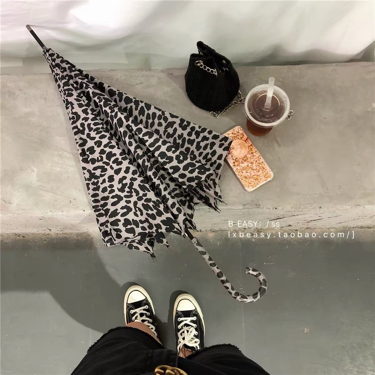 Gray leopard print umbrella lifestyle display