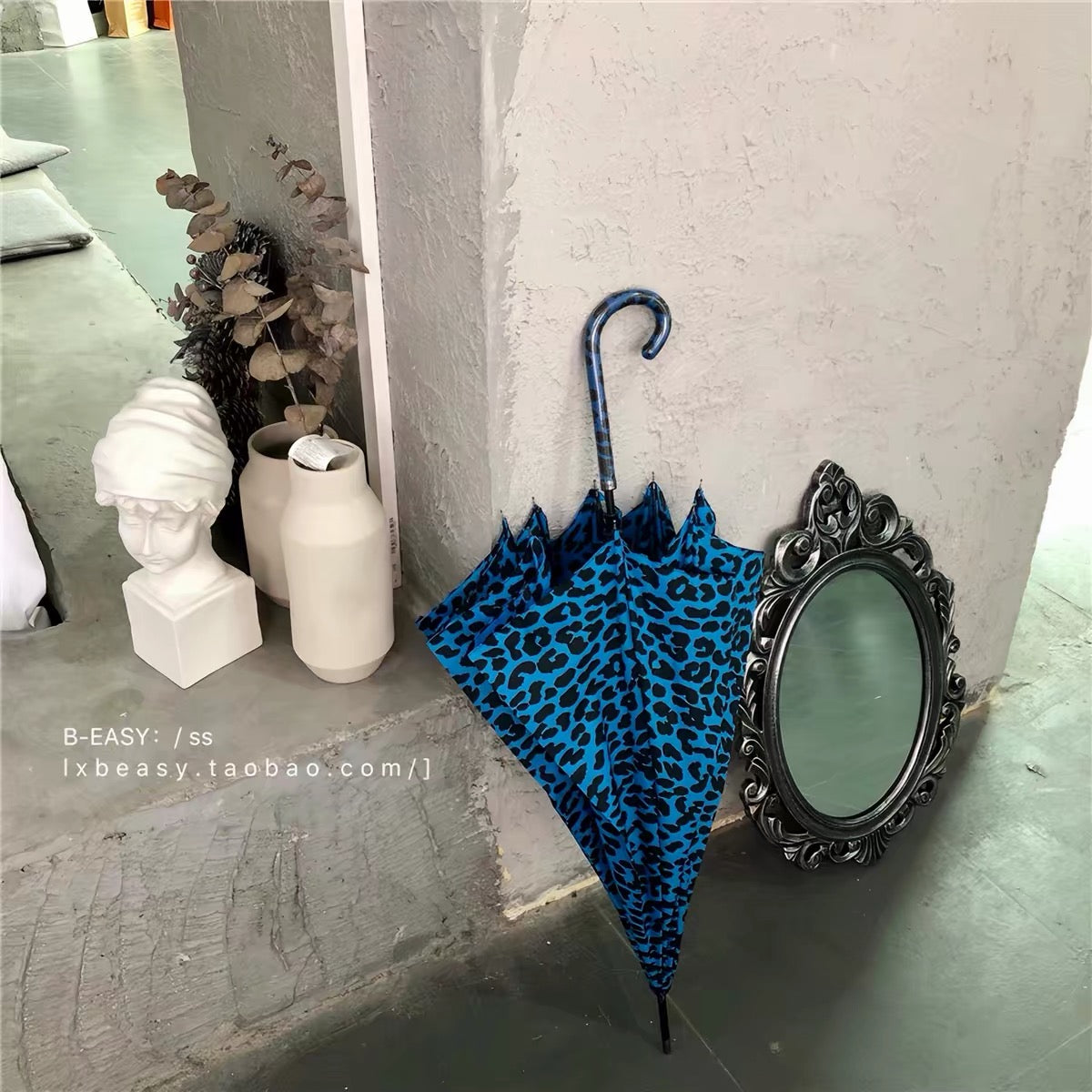 Blue leopard print umbrella display