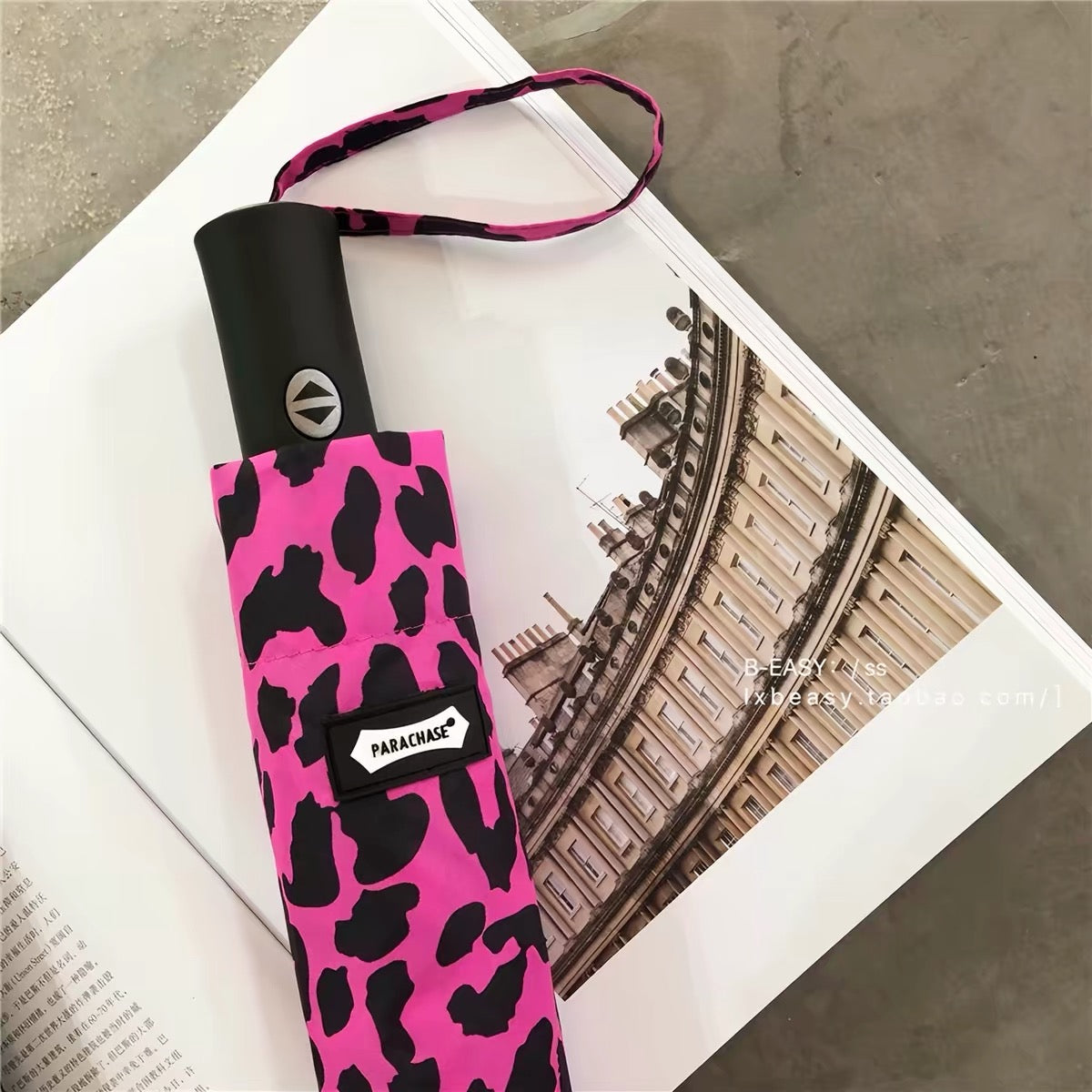 Pink leopard print folded umbrella