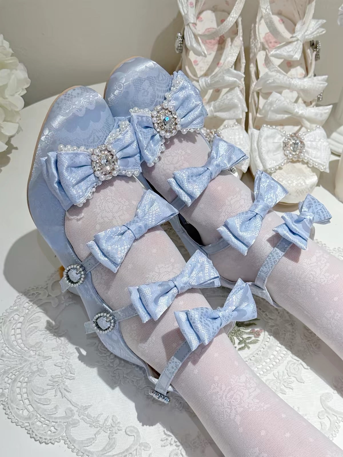 Light blue Lolita bow heels worn
