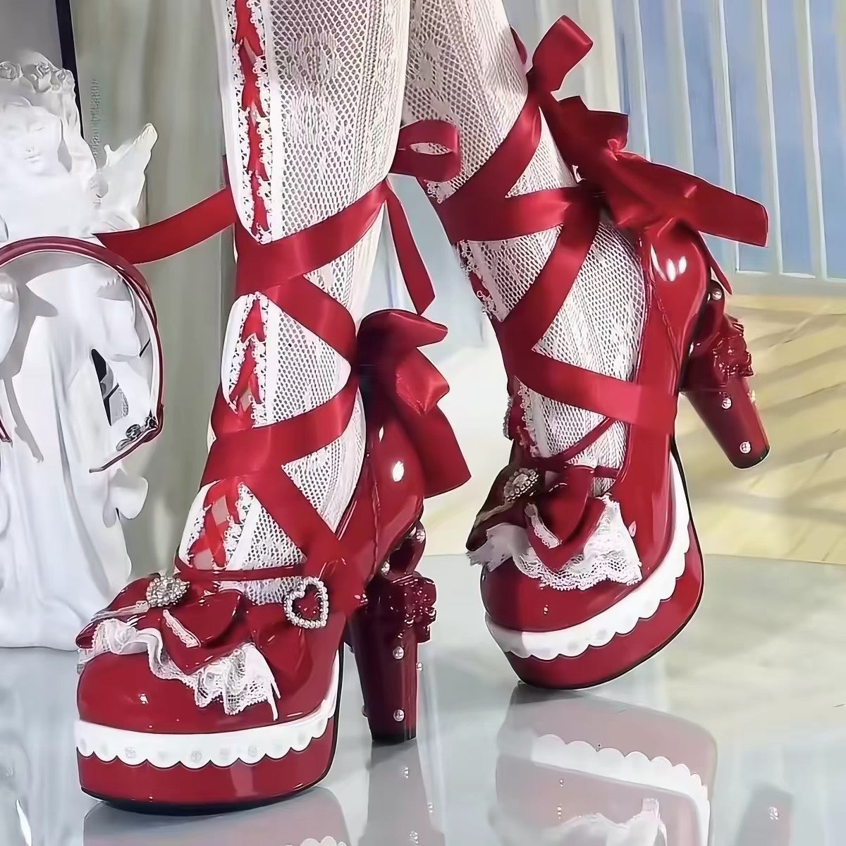 Red Lolita platform heels with bows and ribbon ankle ties