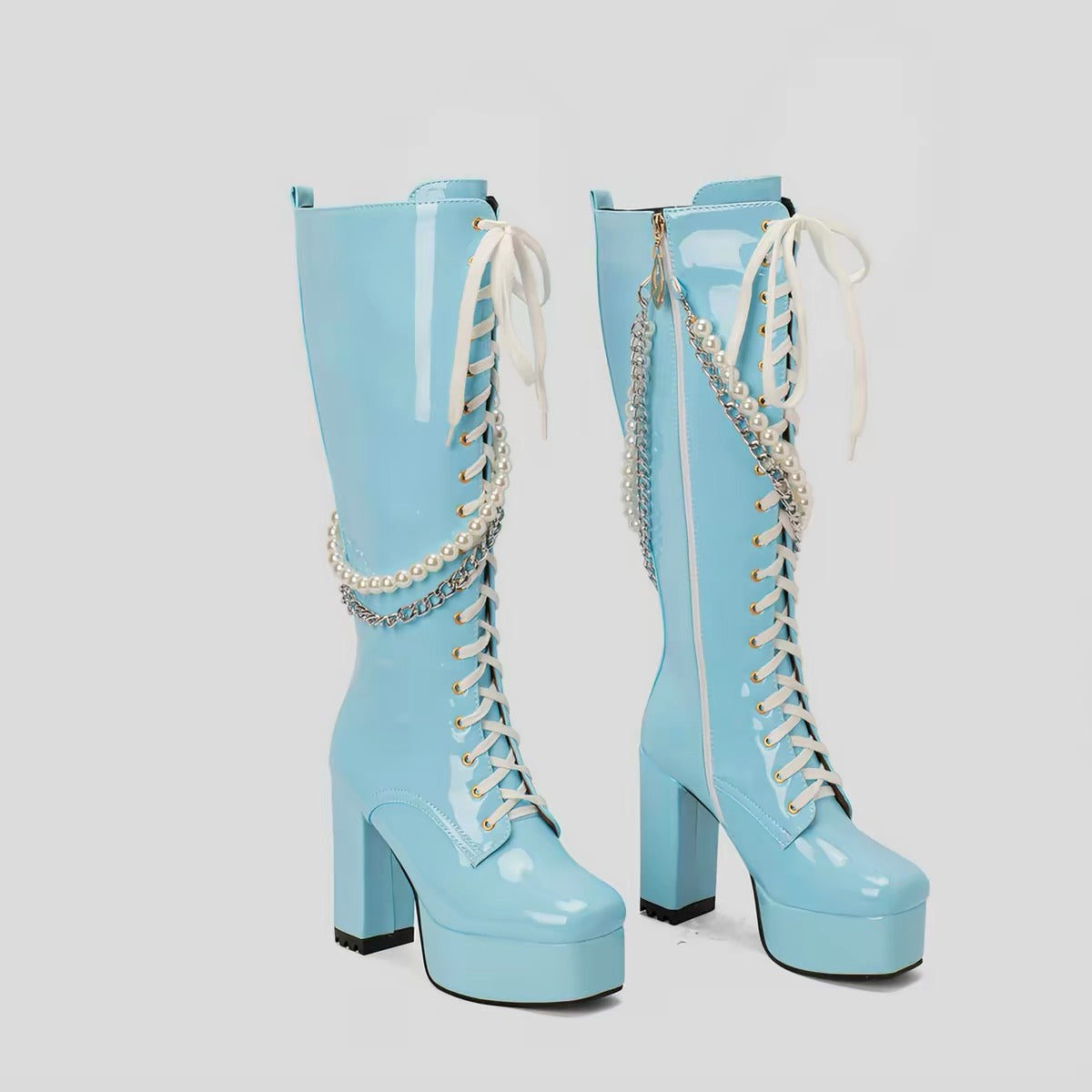 Blue knee-high platform boots pair