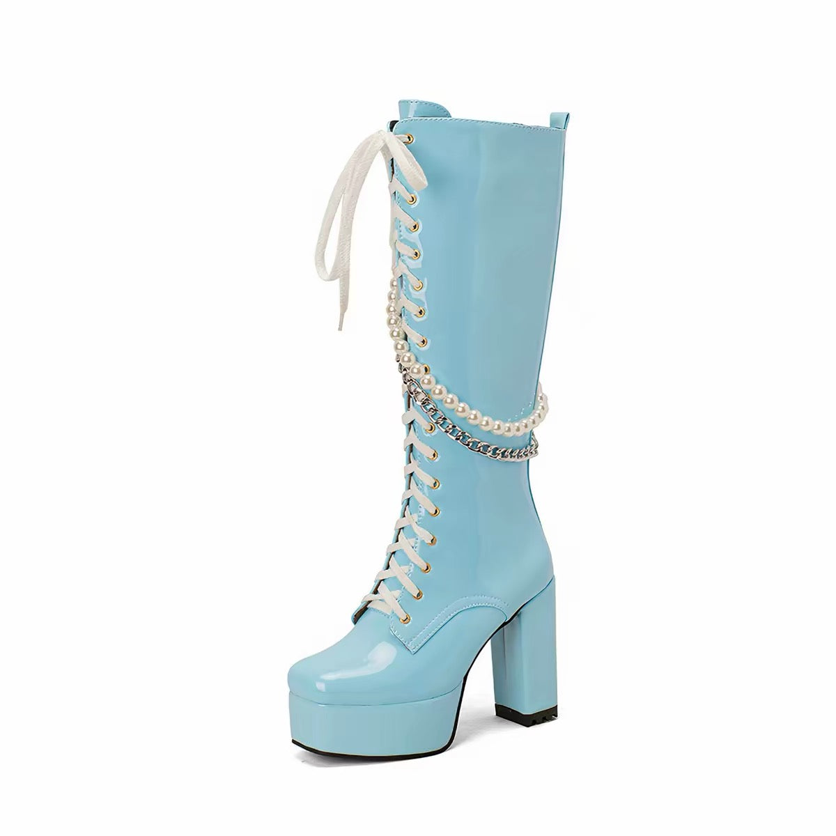 Blue knee-high platform boots with pearl and chain details