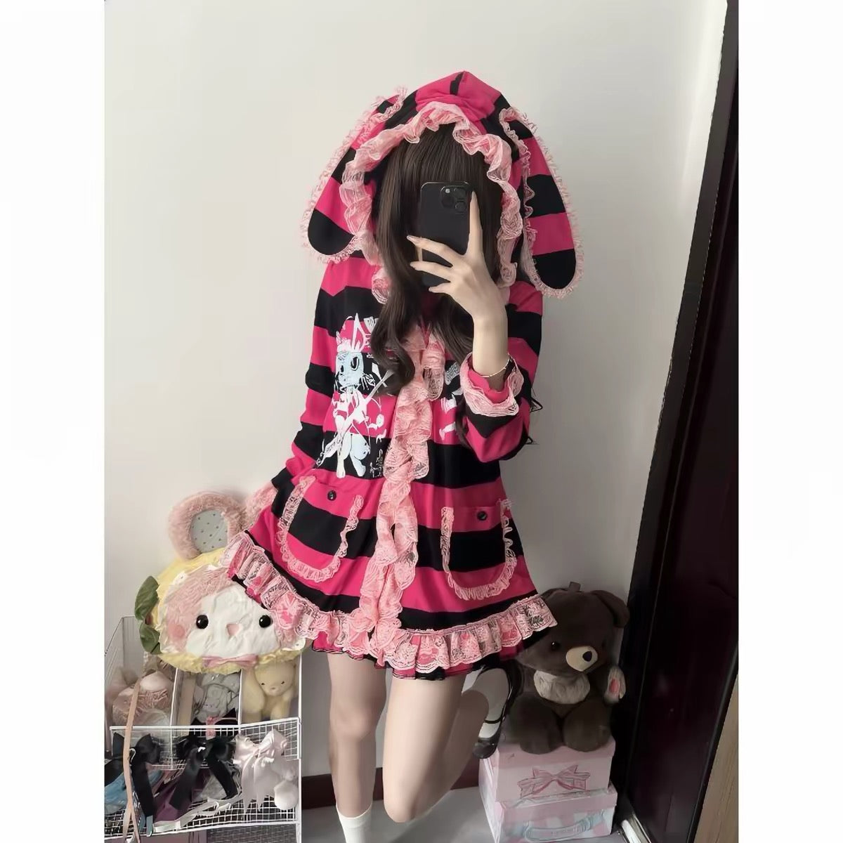 Pink and black bunny hood coat detail