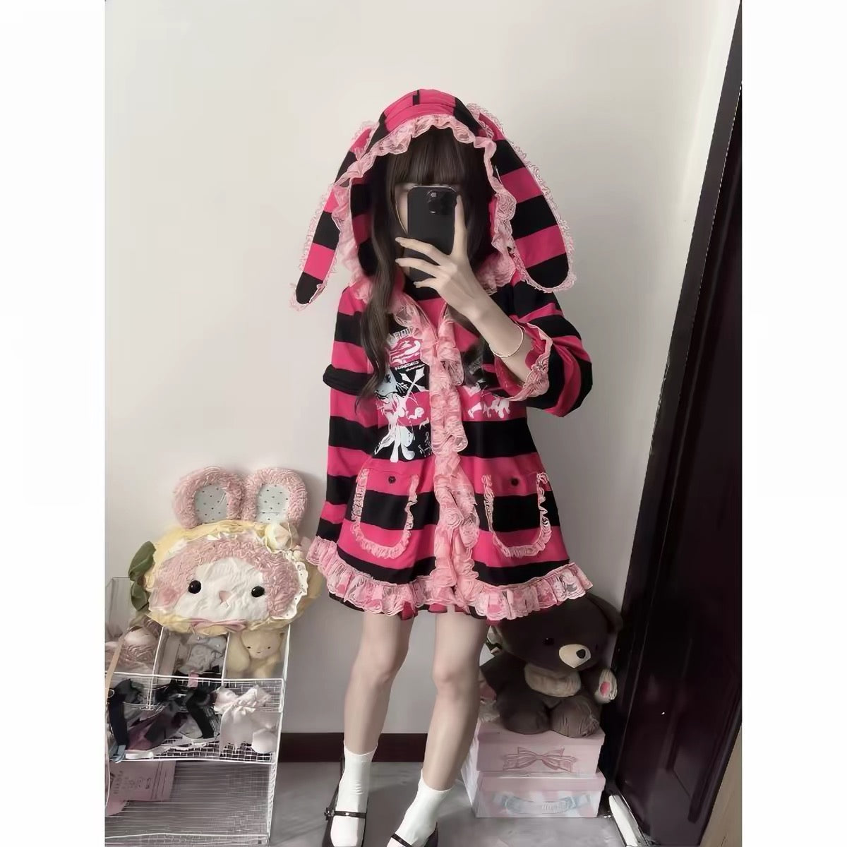 Pink and black bunny hood coat detail