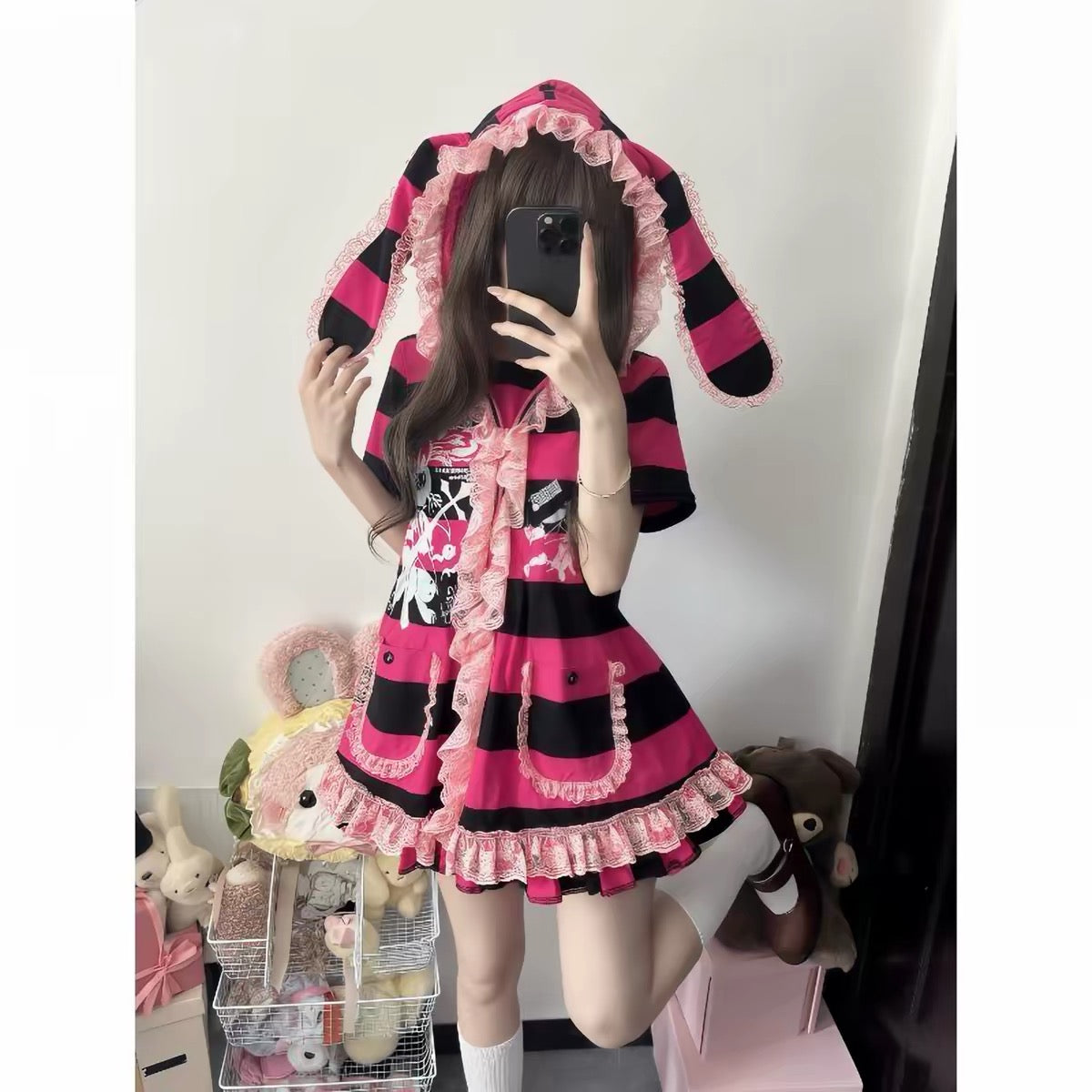 Pink and black bunny hood coat detail
