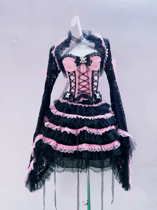 Pink and black lace bolero styled with coordinating corset and skirt