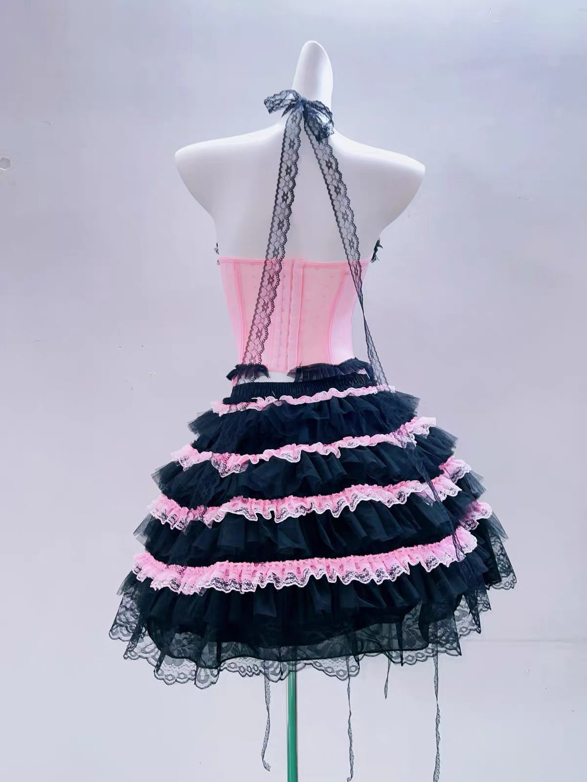 Back view of pink and black layered Lolita skirt