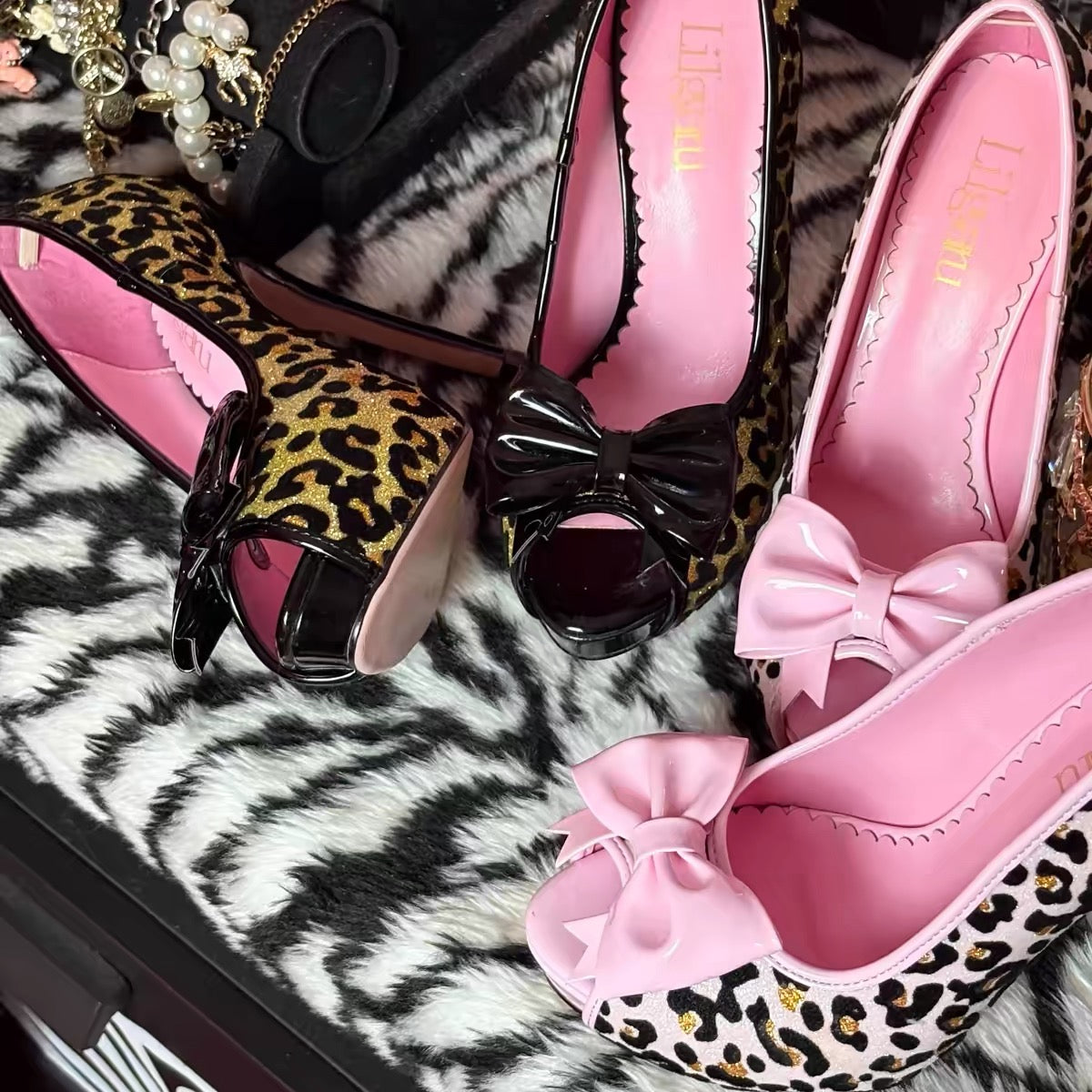 Pink leopard bow platform heels detail