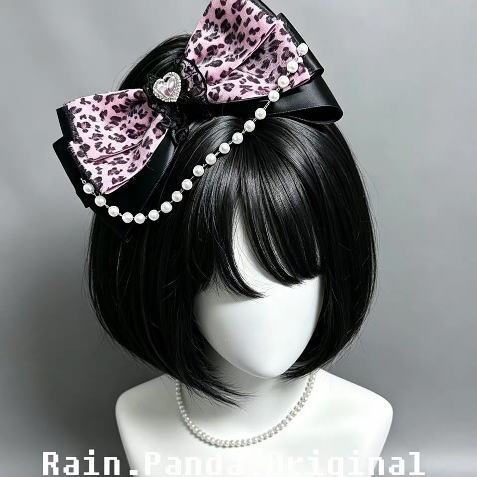 Pink leopard bow hair clip front view