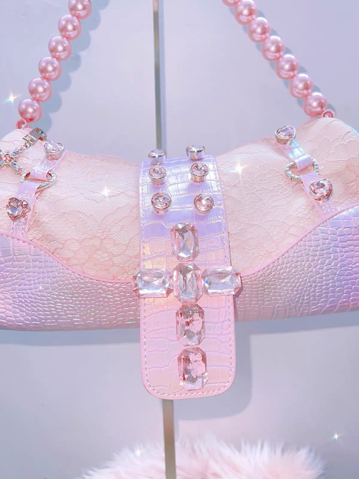 Pink lace rhinestone shoulder bag crystal detail close-up