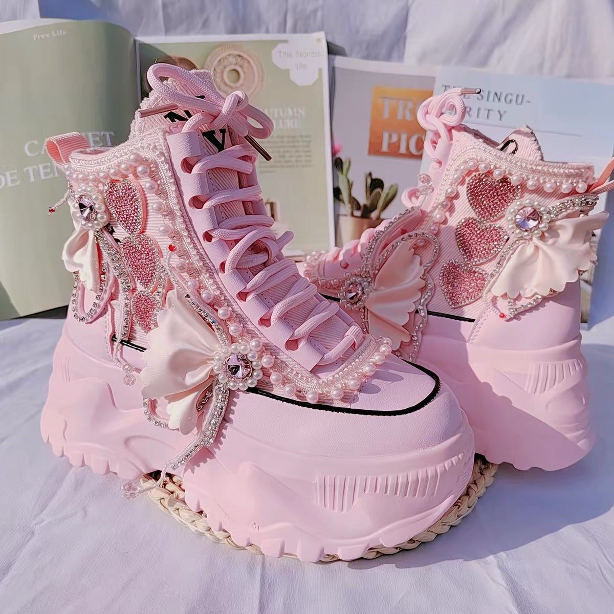 Pink pearl embellished platform sneakers side view