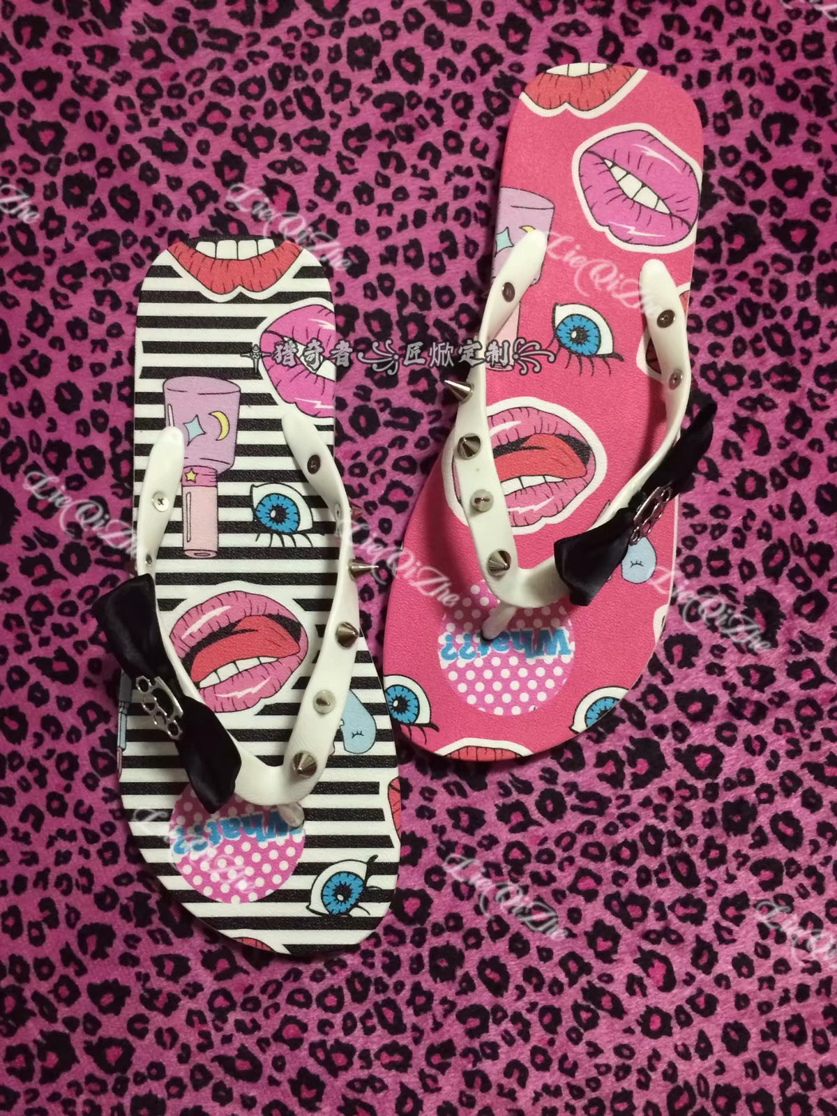 Graphic flip-flops with lips, eyes, striped and pink prints