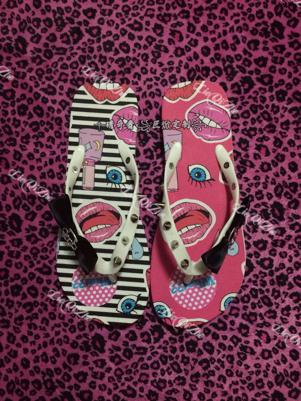 Pink and striped graphic flip-flops product view