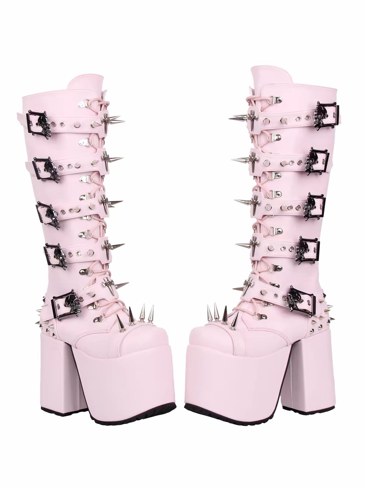 Pink knee-high platform boots with spikes, buckles and metal hardware
