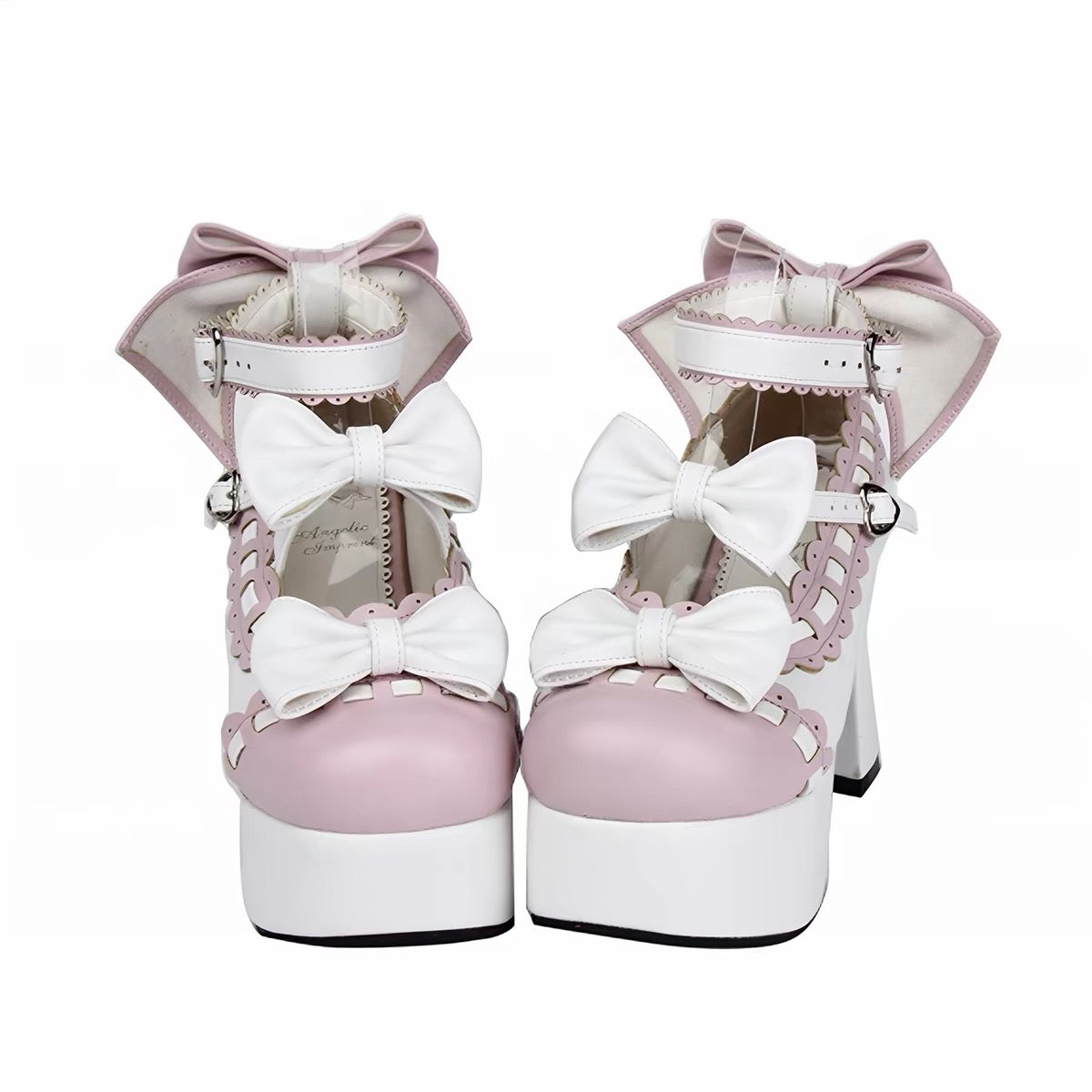 Pink and white platform heels with layered bow details, top front view