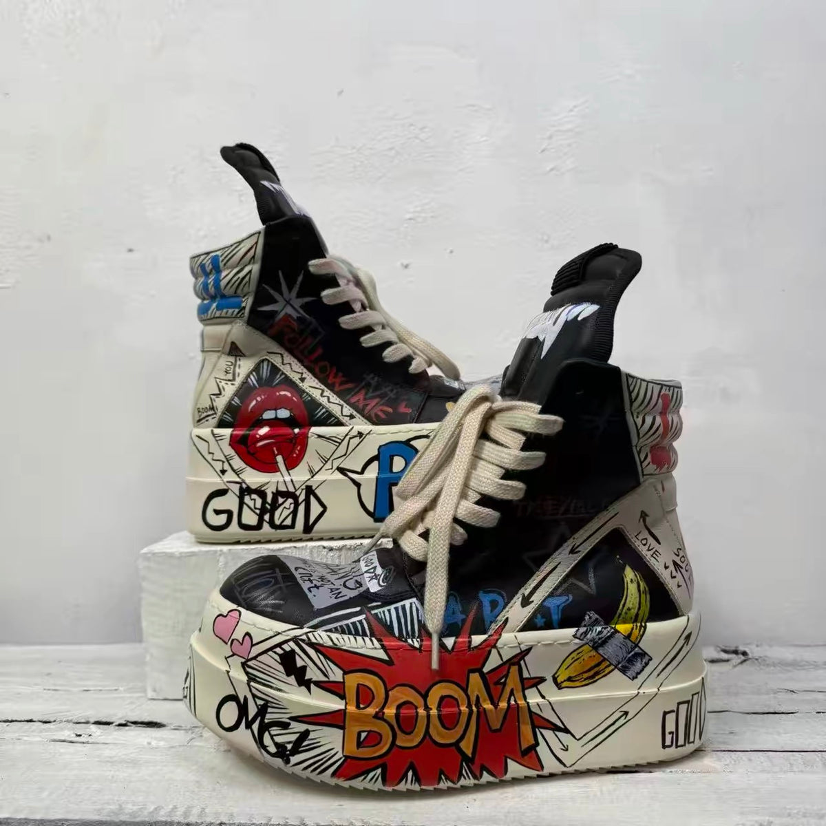 Pop-art platform high-top shoes in black and cream