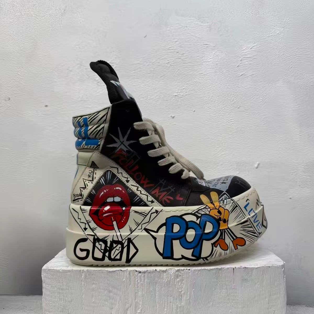 Black pop-art platform high-top shoes profile