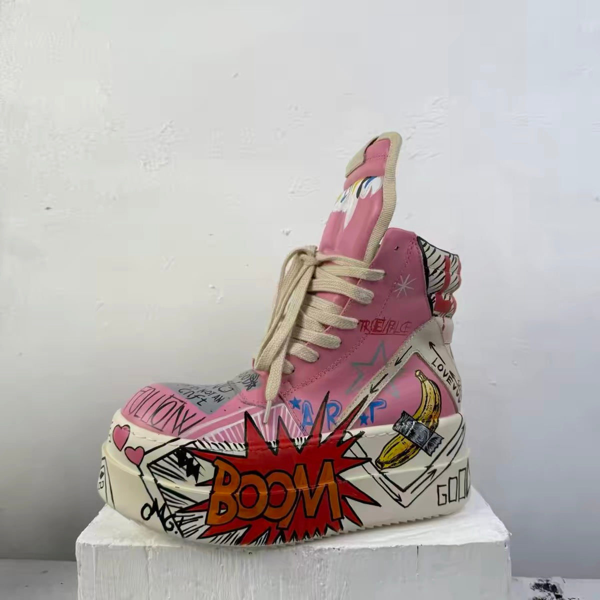 Pink pop-art platform high-top shoes profile
