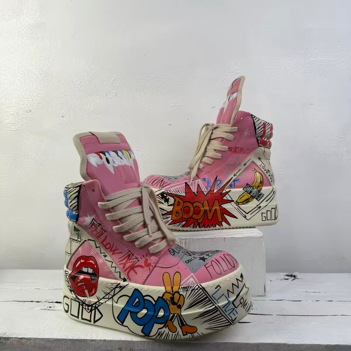 Pink pop-art platform high-top shoes pair